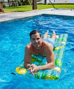 Pool Candy PoolCandy Inflatable Tropical Print Pool Raft - 74x30 Inches -SUNFLOW Shop 715c53a9998f3efa94d780e56e12c59b 29532.1669785284